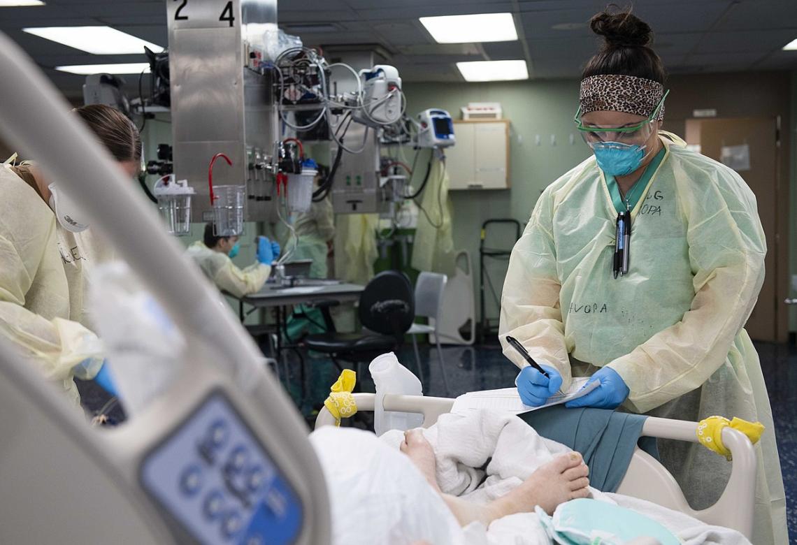 U.S. Navy Doctors, Nurses and Corpsmen Treat COVID Patients in the ICU Aboard USNS Comfort