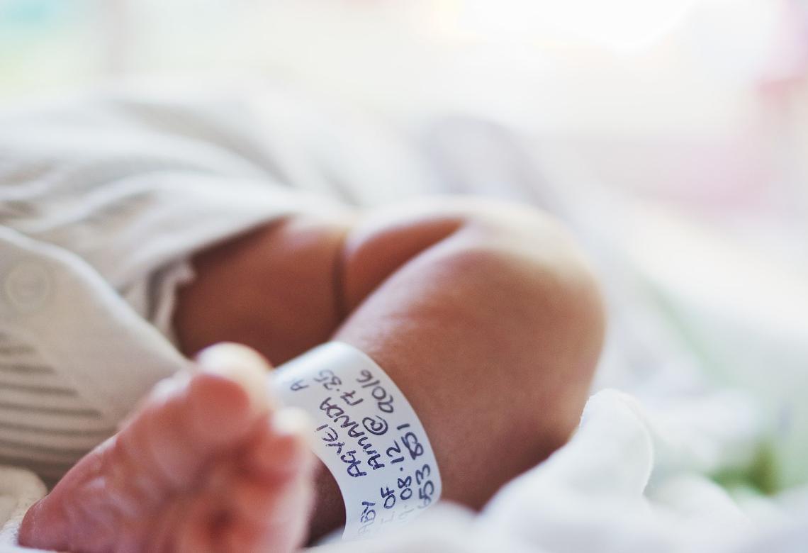 Baby leg with hospital tag