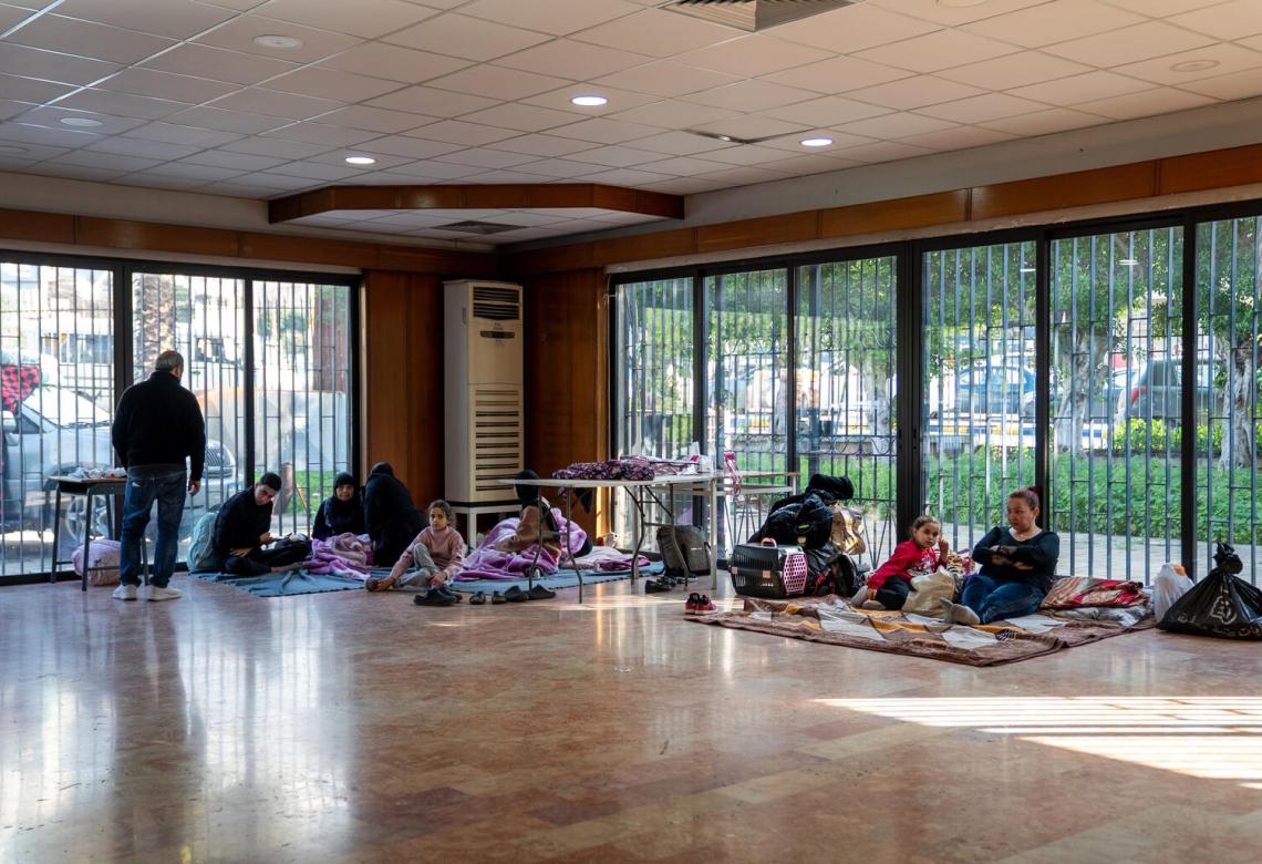 On 3 March 2026, in Mount Lebanon, families sit in a public school turned into a shelter. UNICEF team is on the ground providing emergency supplies including mattresses, blankets, water, hygiene, baby and dignity kits. The escalation in hostilities pushed many families to leave their homes from different villages in the south of Lebanon and southern suburbs of Beirut seeking shelters in the public schools.